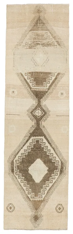 Full top view of the 2'11" x 10'8" beige and brown vintage Anatolian runner rug on a white background.