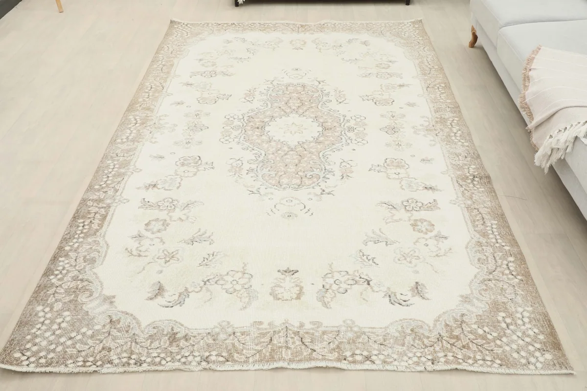Overhead view of the rug placed in a room, showing its full dimensions and design