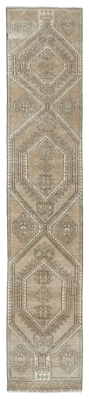 Full overhead view of the 2x12 vintage Anatolian runner rug with geometric diamond patterns.