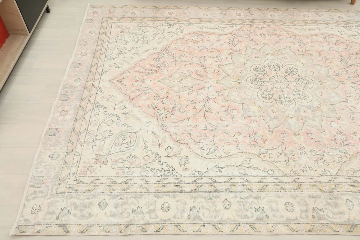 Close-up angled view showing the intricate patterns and soft color variations.