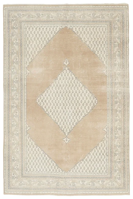 Full overhead view of the 5'3" x 7'7" vintage tan and beige geometric Anatolian rug