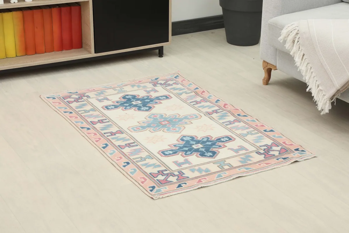Angle view of the rug in a room, highlighting its placement and colors within the decor