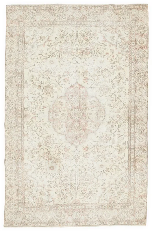 Full top view of the 6'1" x 9'7" ivory and rose vintage Anatolian area rug on a white background.