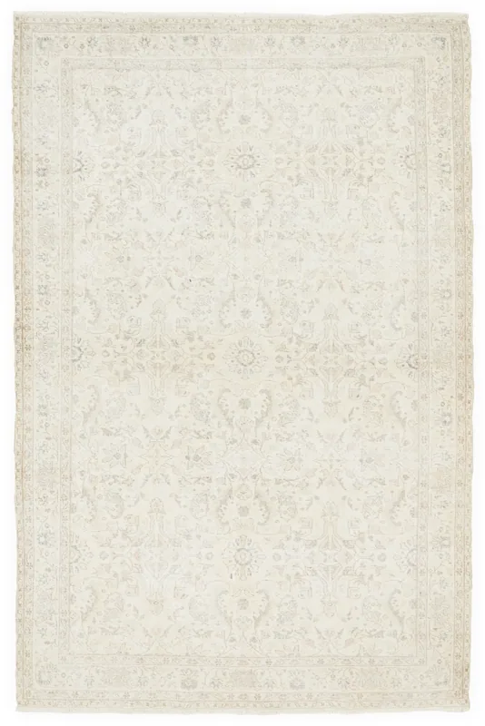 Full overhead view of the 6x10 ivory floral vintage Anatolian area rug