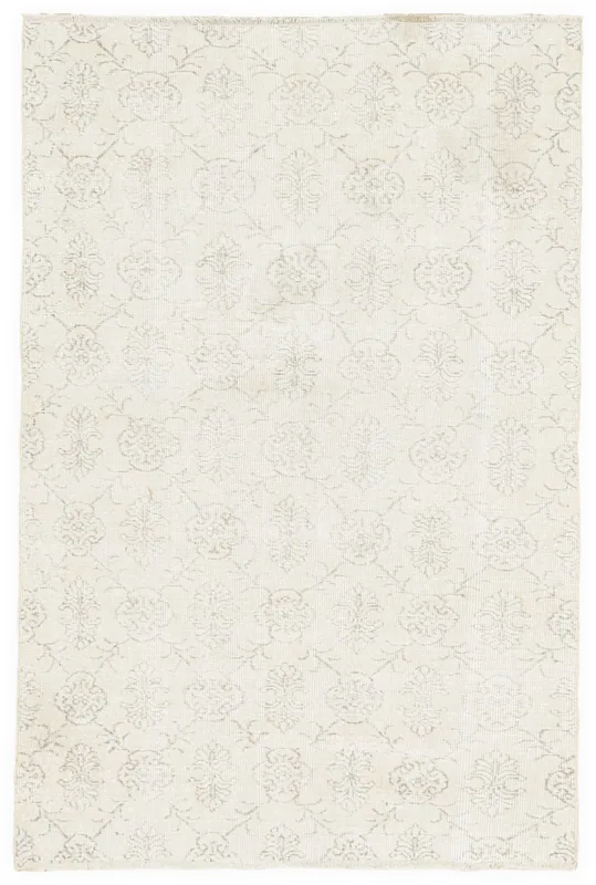 Full top view of the 4x6 ivory and gray vintage Anatolian rug on a white background