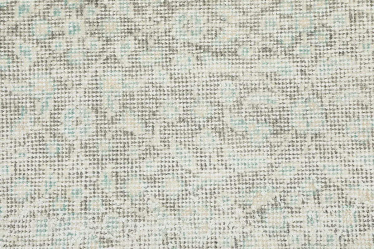 Detailed close-up of the rug's low wool pile, showing the hand-knotted texture and natural wear.