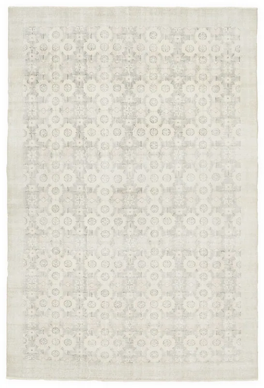 Full top view of the 7x10 cream and gray vintage Anatolian area rug on a white background.