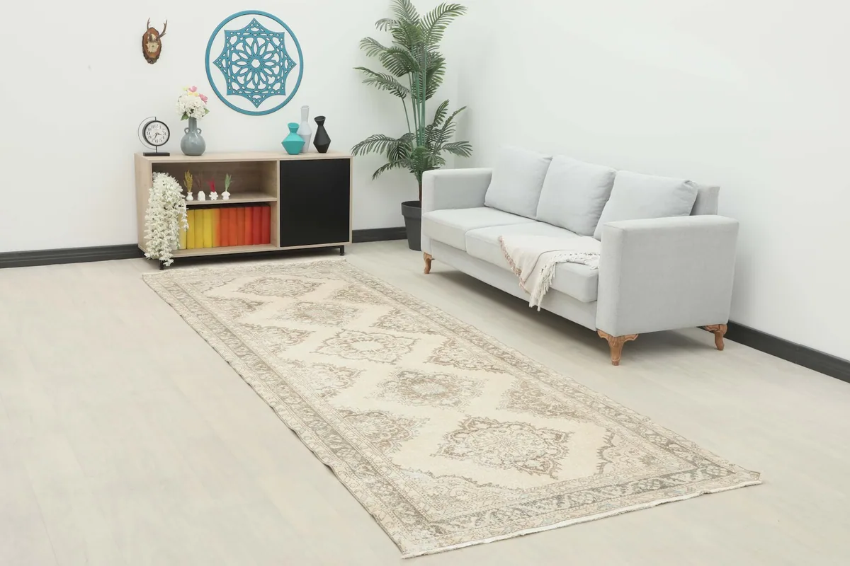 Runner displayed in a living room setting, extending from a couch.