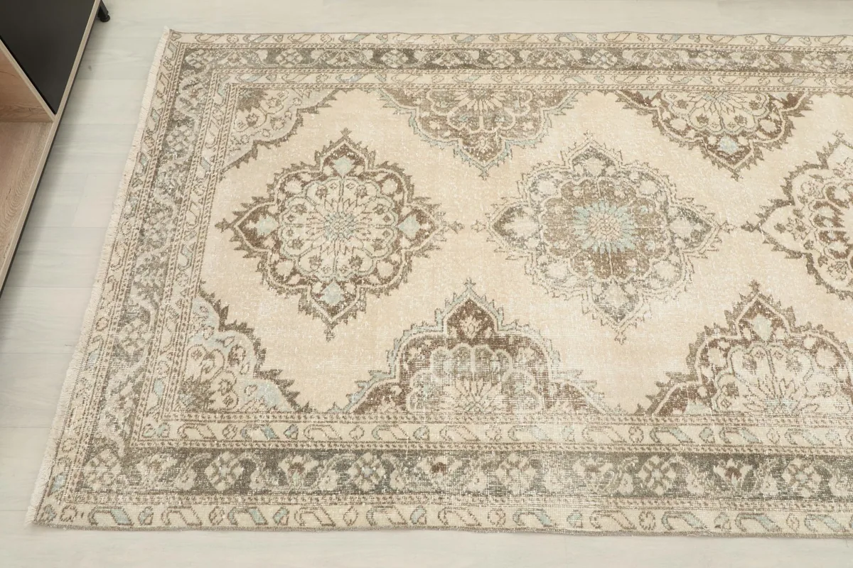 Overhead view showing a section of the runner with its geometric medallion design.