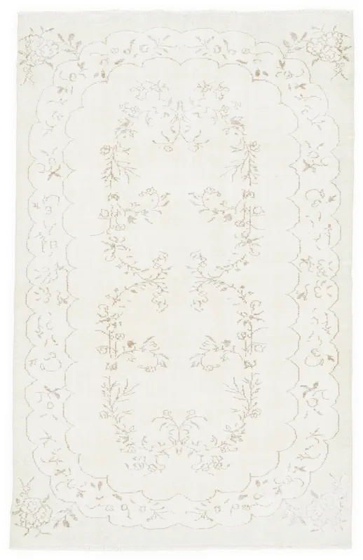Full top view of the 6x10 ivory beige floral vintage Anatolian area rug