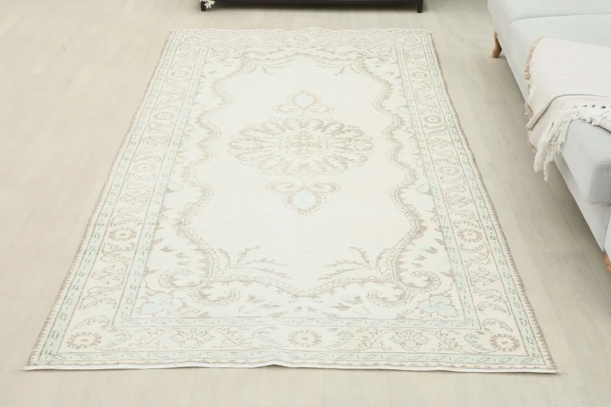 Full overhead view of the vintage Anatolian rug in a room setting