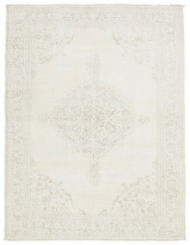 Full overhead view of the vintage ivory and gray Anatolian medallion rug