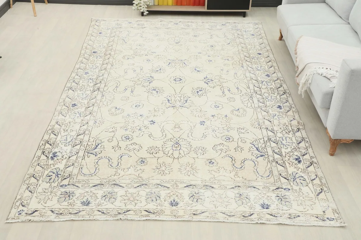 Overhead view of the large vintage rug in a room, showcasing its full size and design