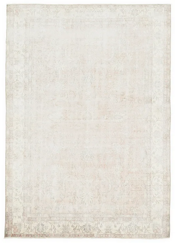 Full top view of the 7x10 muted rose floral Anatolian area rug on a white background.