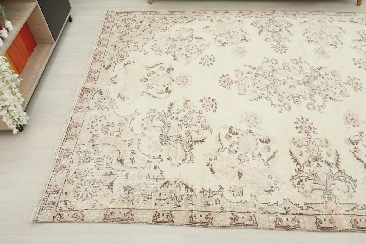 Another corner perspective of the rug, showing its overall pattern and soft tones