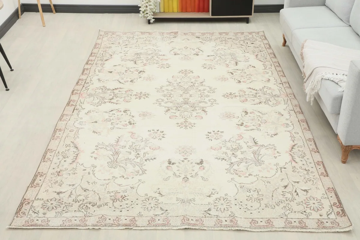 Full room view of the 7x10 ivory floral rug complementing the decor