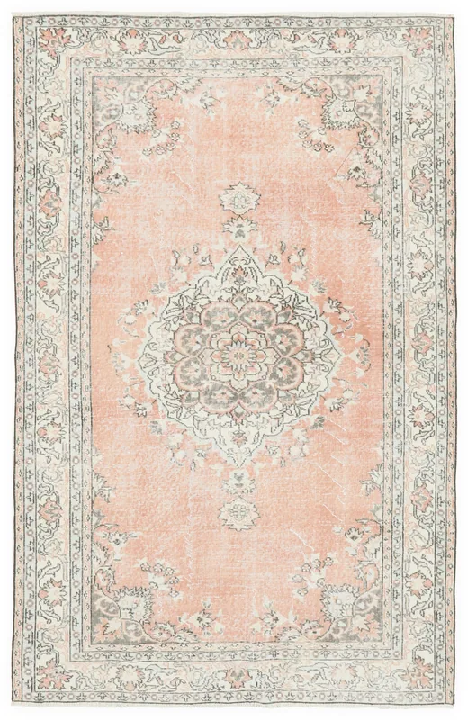 Full overhead view of the rose vintage Anatolian area rug on a white background
