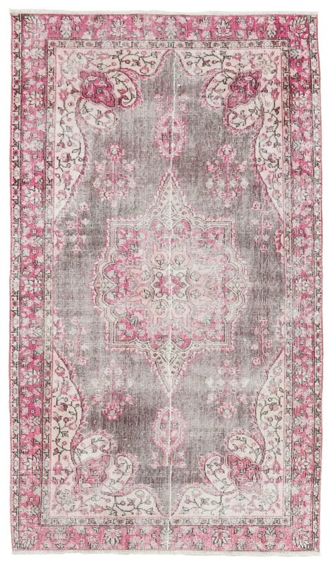 Full top view of a 3'6" x 6'2" vintage Anatolian area rug with rose and gray colors