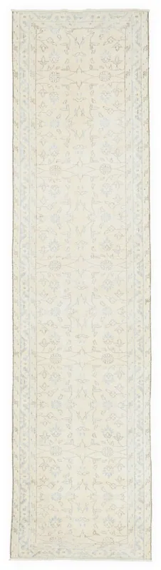 Full top view of the 2'8" x 11'6" hand-knotted vintage Anatolian runner rug with ivory and blue patterns.