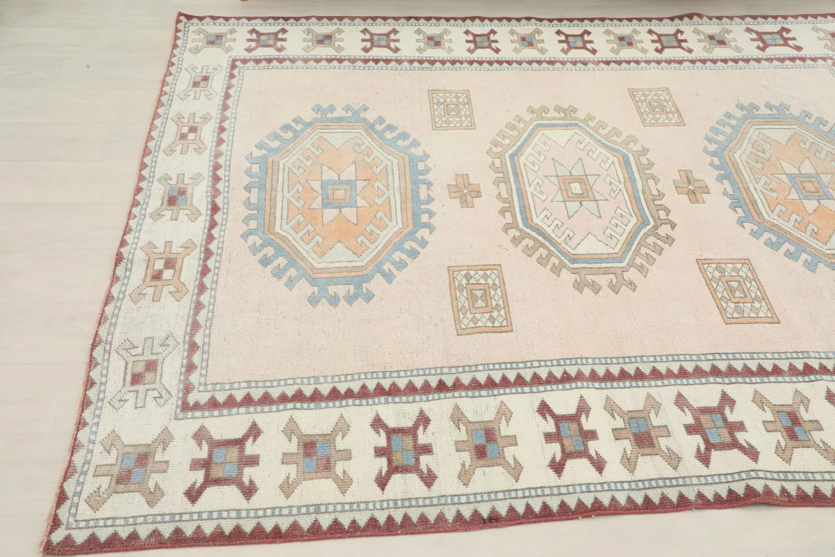 Close-up angled shot revealing the texture and varied colors within the geometric motifs.