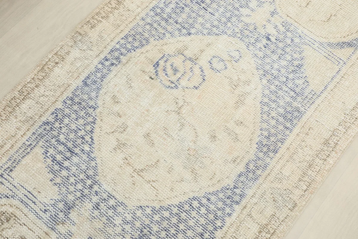 Overhead view focusing on the central medallion and surrounding blue geometric patterns
