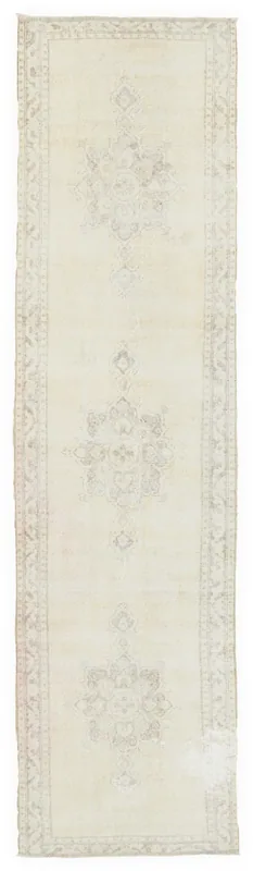 Full overhead view of the 2'10" x 11'5" cream geometric Anatolian runner rug