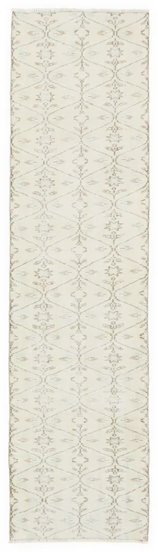 Full overhead view of the 2'6" x 10'4" cream geometric vintage runner on a white background.