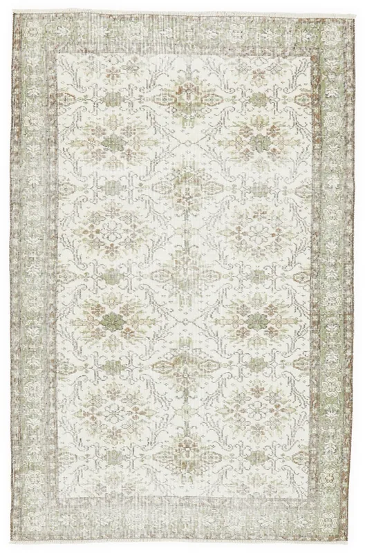 Full overhead view of the 4x7 ivory, green, and brown vintage Anatolian rug