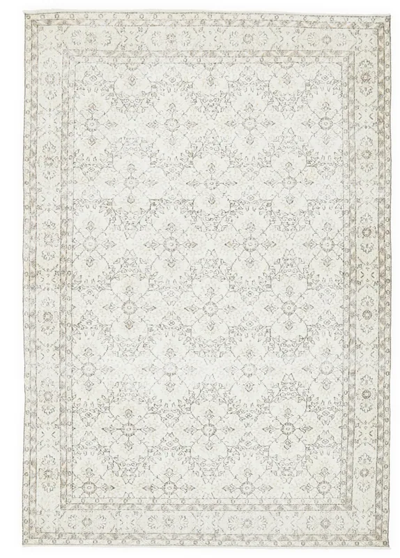 Full overhead view of the 6'8" x 10'0" cream and gray vintage Anatolian area rug.