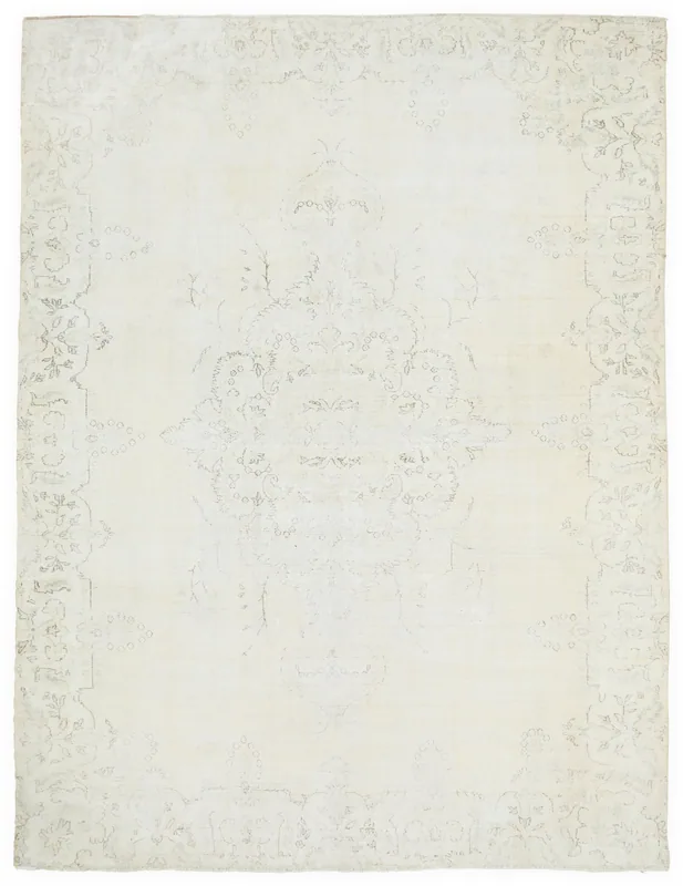 Full overhead view of the cream vintage Anatolian rug with faded floral medallion and border.