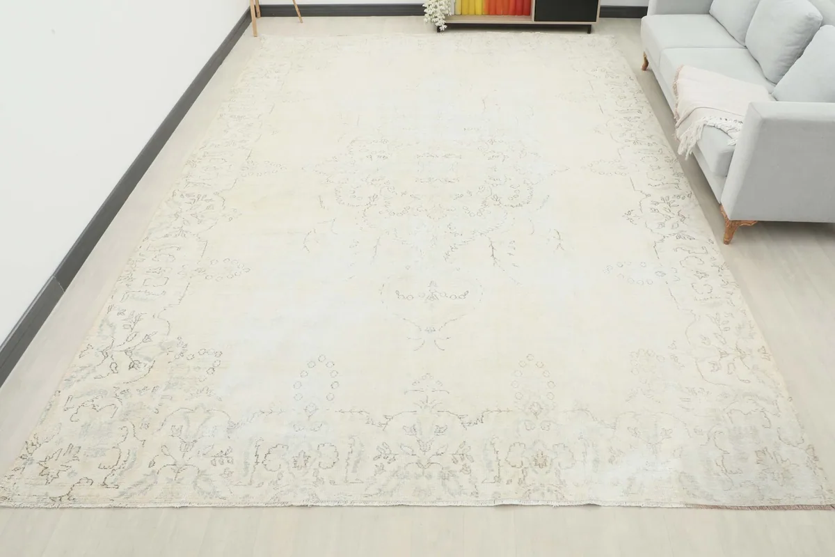 Full room view of the oversized cream rug, showcasing its placement and aesthetic impact in a living space.