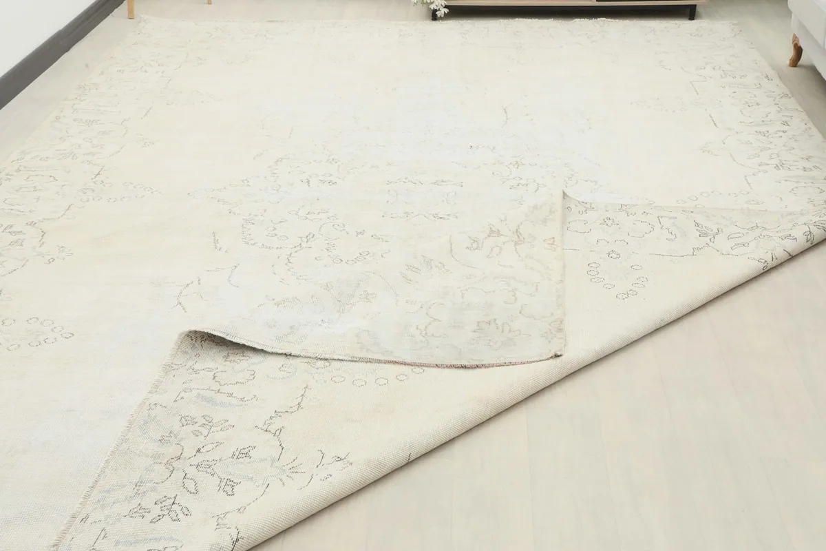 Larger view of the rug's reverse side, showing the hand-knotted construction and wool pile on cotton foundation.
