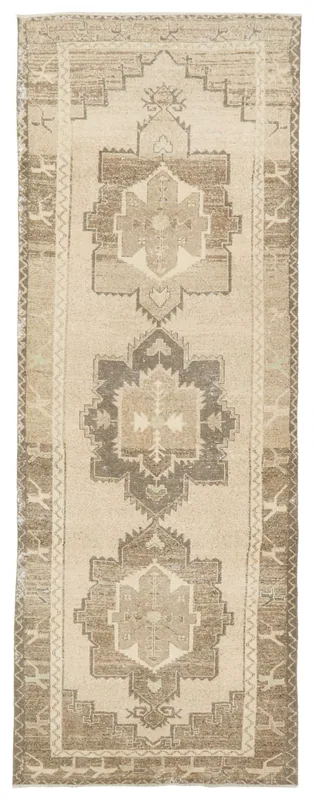 Full top view of the beige and brown geometric vintage Anatolian runner rug.