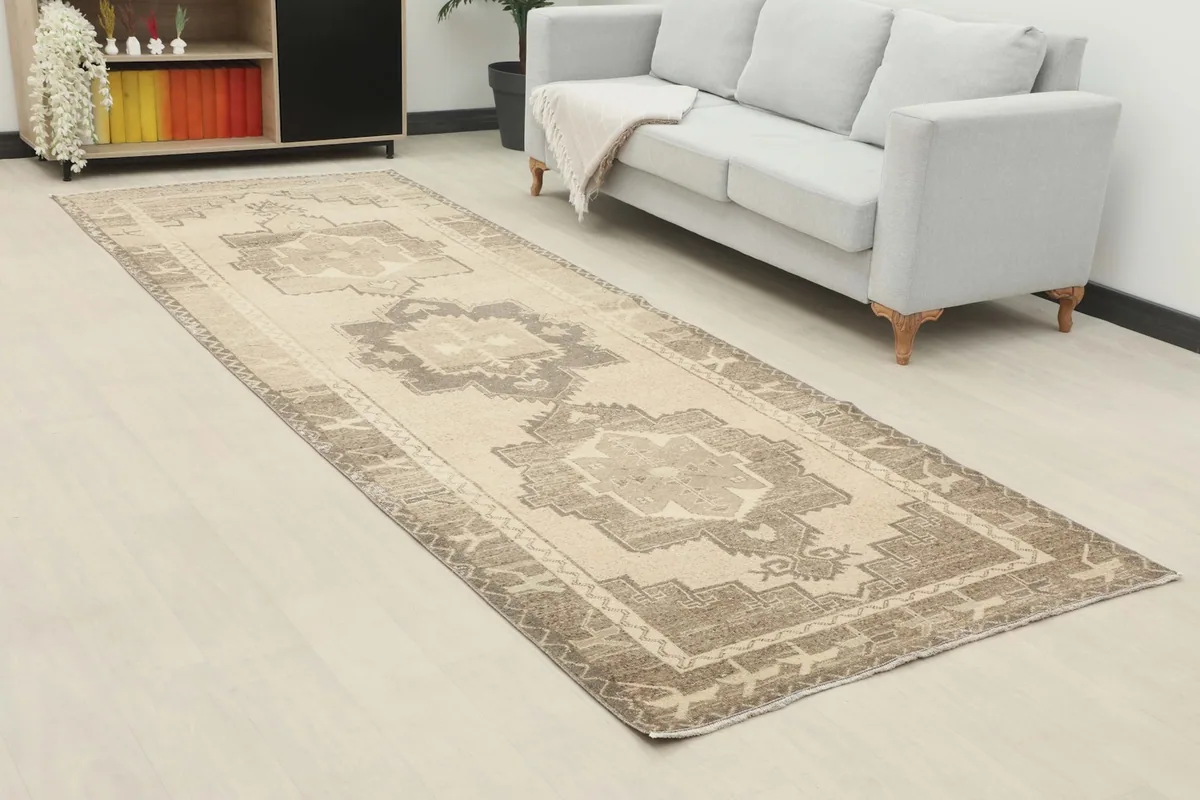 Angle view of the runner rug in a room setting, highlighting its length and pattern.