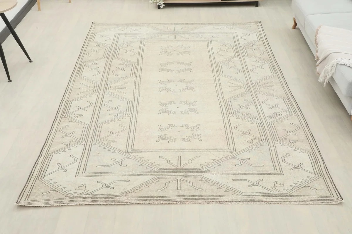 Full room view of the 6'7" x 9'3" vintage Anatolian rug, demonstrating its scale and impact in a living space.
