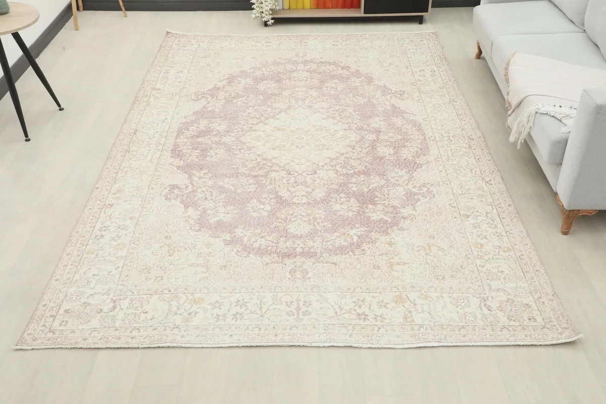 Full room view of the 7'1" x 10'7" vintage Anatolian rug laid out, providing context for its size and design