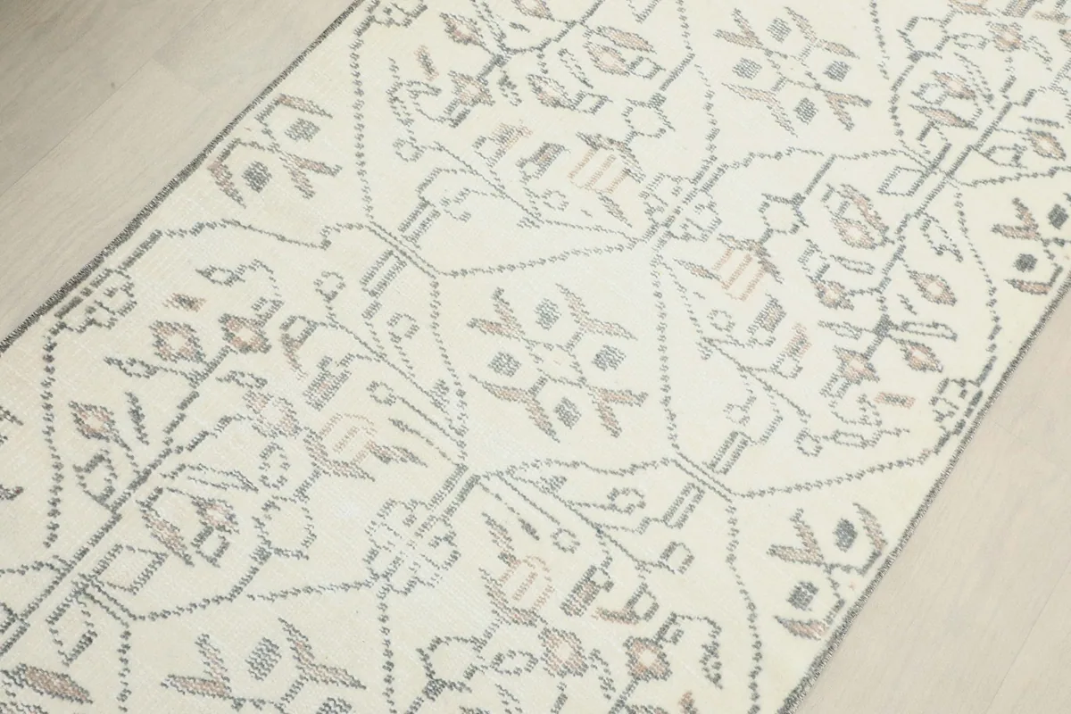 Overhead angled view highlighting the full pattern repeat and the rug's overall condition