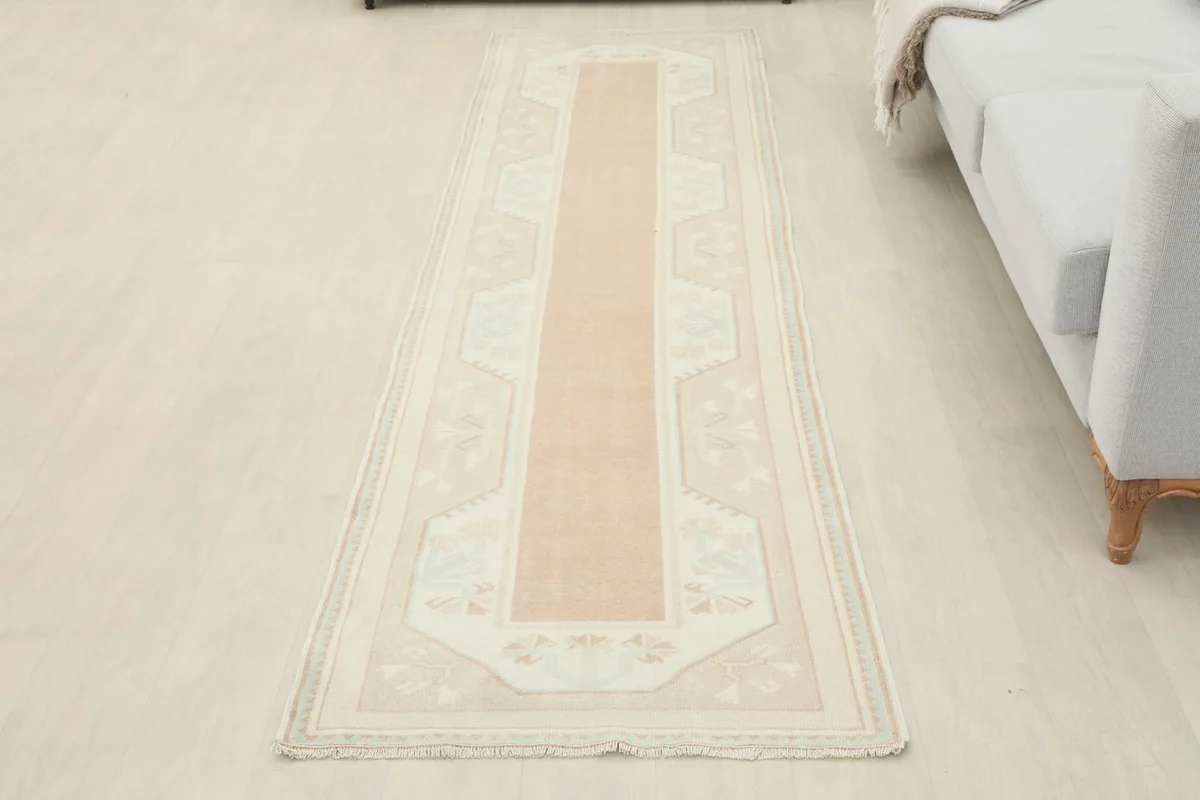 Full room view of the runner laid out, providing a sense of its scale and presence.