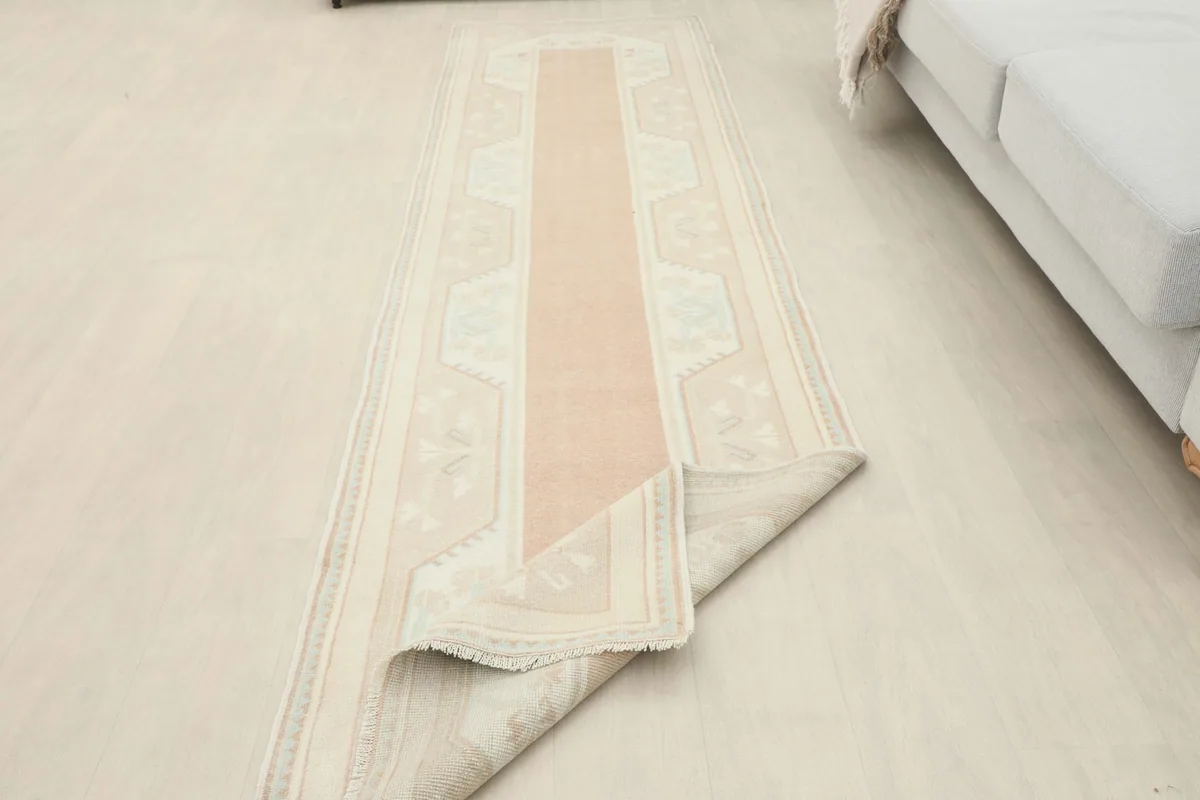 Runner with one end folded back, revealing the underside and the full length.