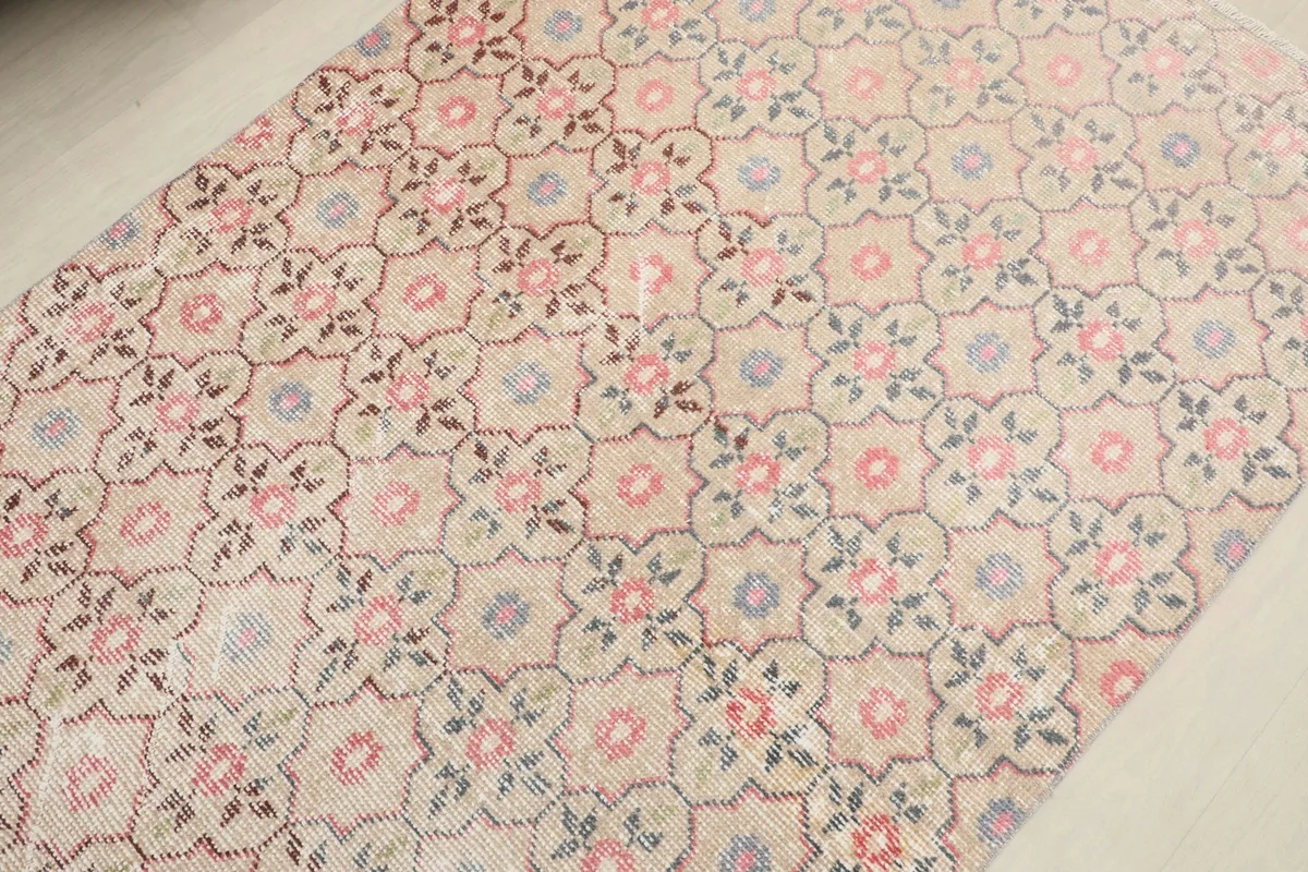 Overhead angled shot of the rug, detailing the overall pattern and subtle color shifts.