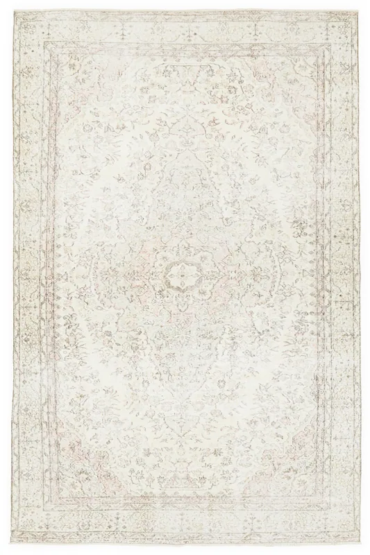Full top view of the vintage ivory and rose Anatolian area rug, showcasing its medallion and floral pattern.