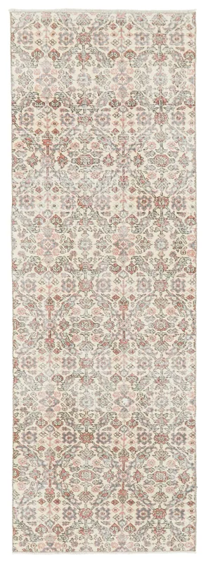 Full overhead view of the 2'9" x 8'6" vintage Anatolian runner rug with an ivory field and rose and blue motifs