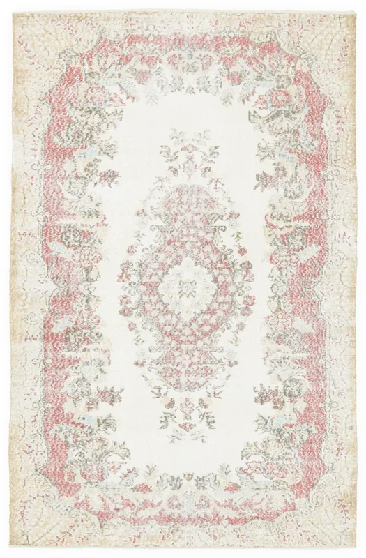 Full overhead view of the vintage Anatolian rug with a cream field and rose floral patterns.