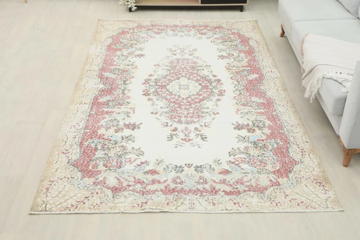 Full overhead view of the rug in a room, providing a sense of its scale relative to the furniture.