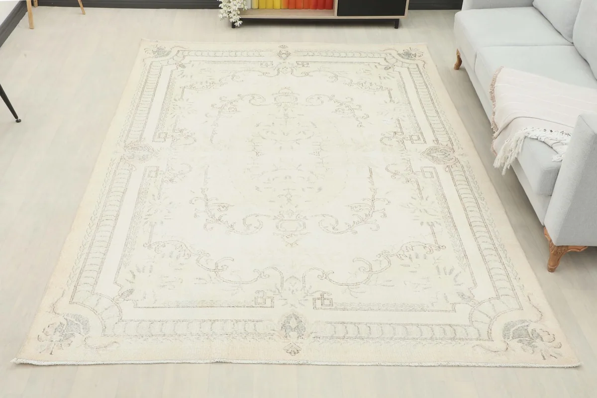 Full room view of the 7x10 vintage rug, complementing modern decor with its neutral palette