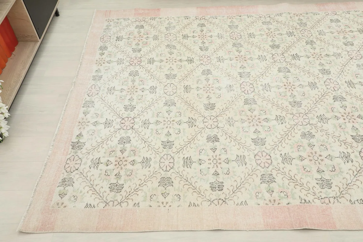 Another corner view of the vintage Anatolian rug, showcasing its even wear and patina