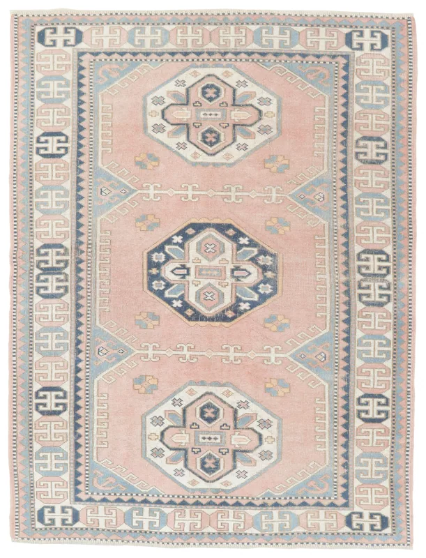 Full overhead view of the 5'6" x 7'8" vintage Anatolian rug with rose field and geometric medallions.