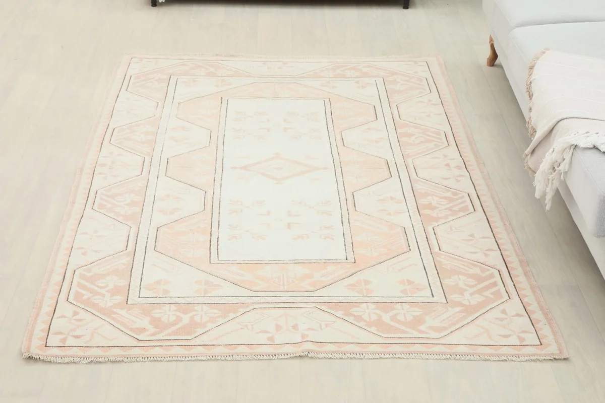 Overhead view of the full rug laid out, showcasing its complete design and proportions.