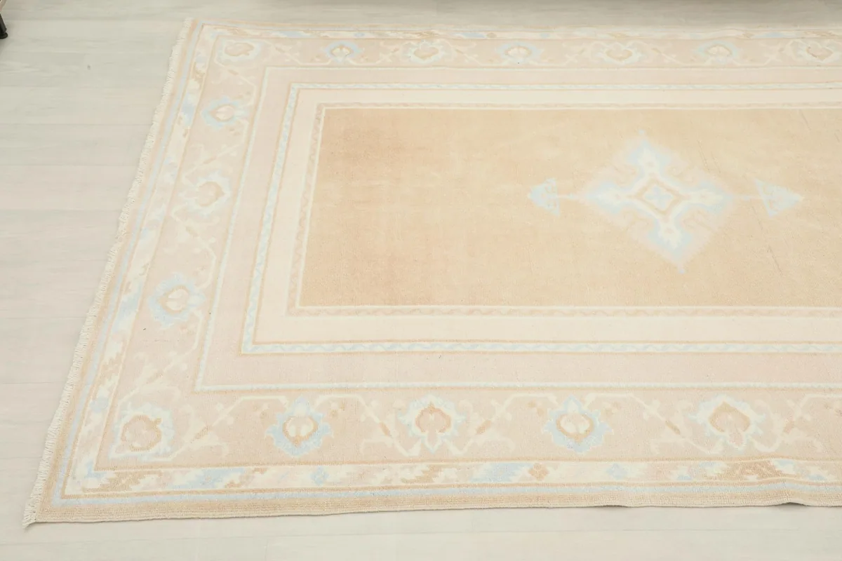 Another angled view of the rug, focusing on the subtle color variations and design details.
