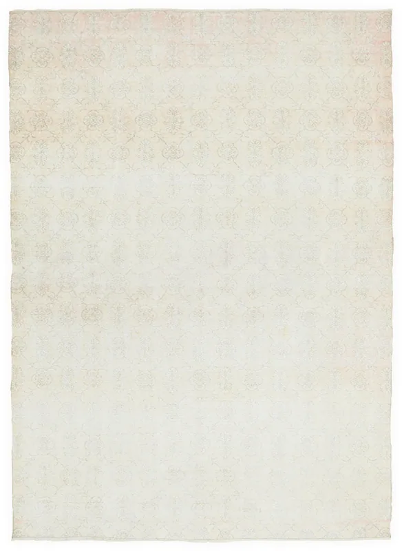 Full overhead view of the 6'11" x 10'4" vintage Anatolian area rug on a white background.